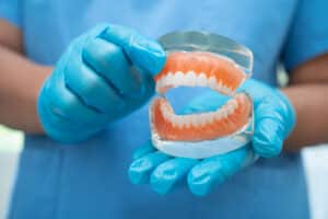 Dentures Vs. Implants Making The Best Decision For Your Dental Health hn