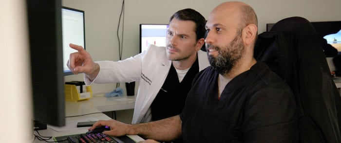 Image of GPS Specialists working on implants